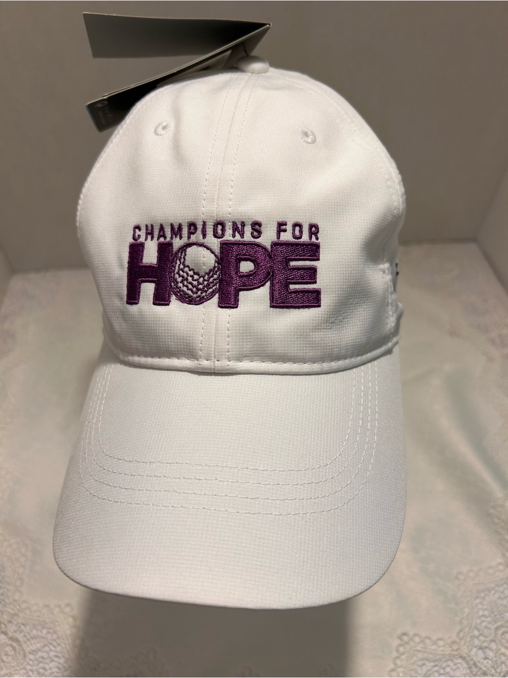 Nike Champions For Hope Dri-Fit Golf Cap with purple embroidery